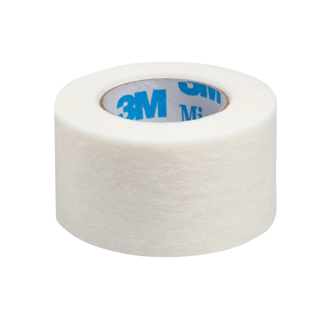 A close-up, straight-on view of a full roll of 3M Micropore white paper tape, highlighting the breathable, non-woven fabric texture.