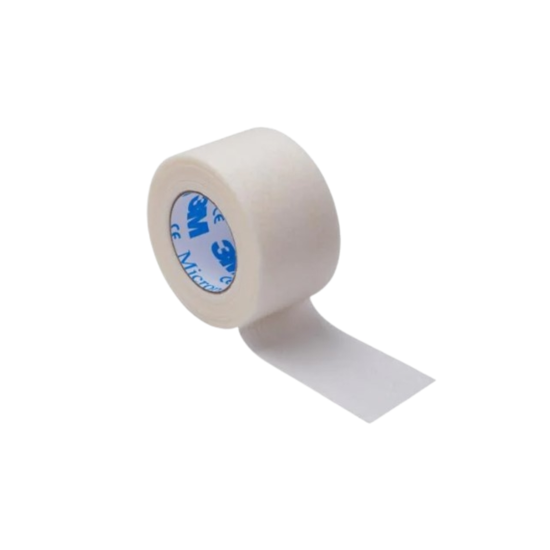 A single roll of white 3M Micropore surgical paper tape, partially unrolled at an angle, on a white background