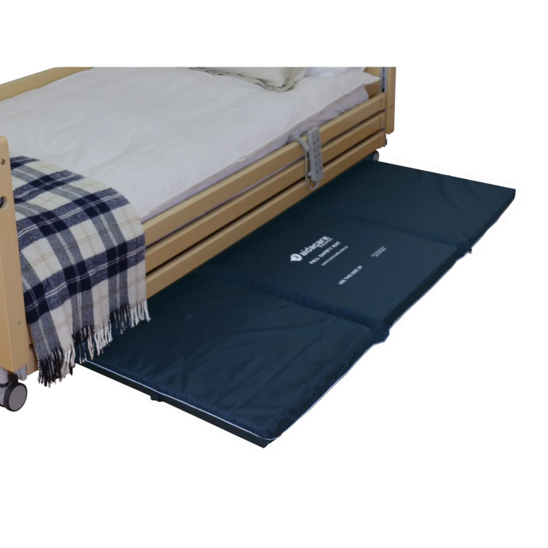 Aspire Lifecomfort Fall Safety Mat – impact-absorbing bedside mat with reflective strip and non-slip base for fall prevention in aged care and home settings.