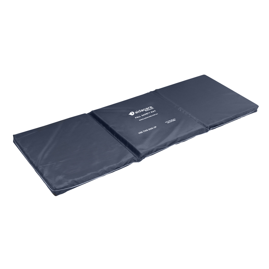 Aspire Lifecomfort Fall Safety Mat – impact-absorbing bedside mat with reflective strip and non-slip base for fall prevention in aged care and home settings.