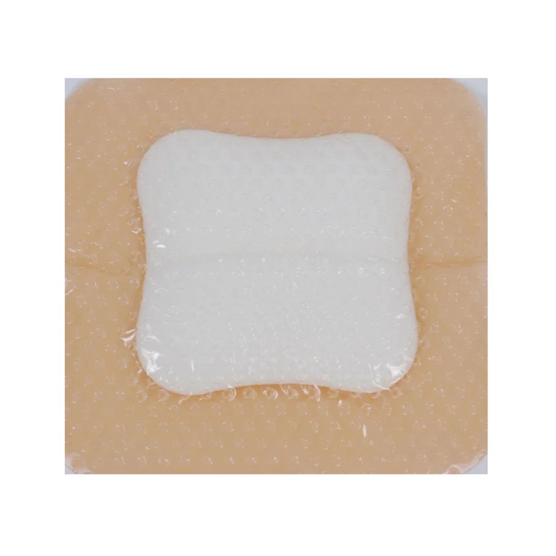 OsmoCel® Si Silicone Hydroporous Foam dressing, bordered, petal shape. The dressing features a beige silicone adhesive border with a white foam center, designed for secure wound coverage and gentle adhesion.
